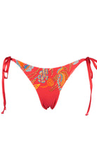 Zahora Red bikini bottom with  colorful tribal patterns decorated with embroidery and beadwork on a white background